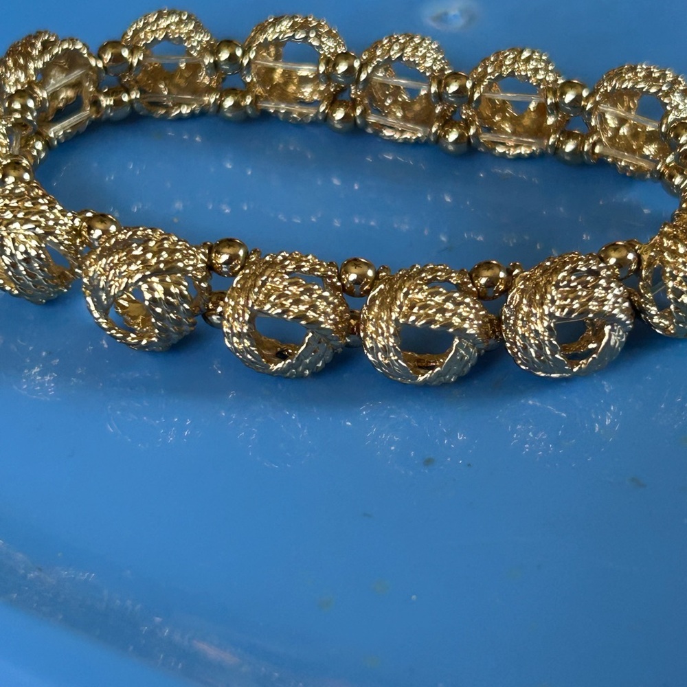 VINTAGE GOLD TONE TEXTURED ROUND OPEN WORK BEADED FIRM STRETCH BRACELET